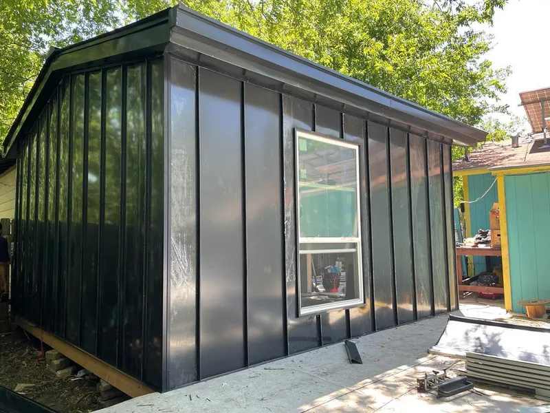 Black standing seam metal wall panels for Metal Roof Installation in Bensville